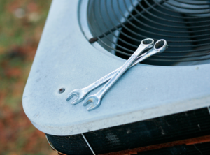 hvac unit and wrenches